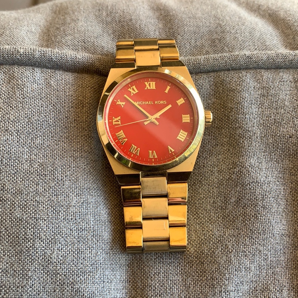 - Michael Kors red and gold watch has a new …